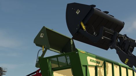 Bressel und Lade Hochkippschaufeln L67 und L71 beim Beladen eines Krone-Anhängers