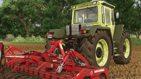MB-Trac mit Gewicht im Feldeinsatz vor einer Horsch Joker 4 CT